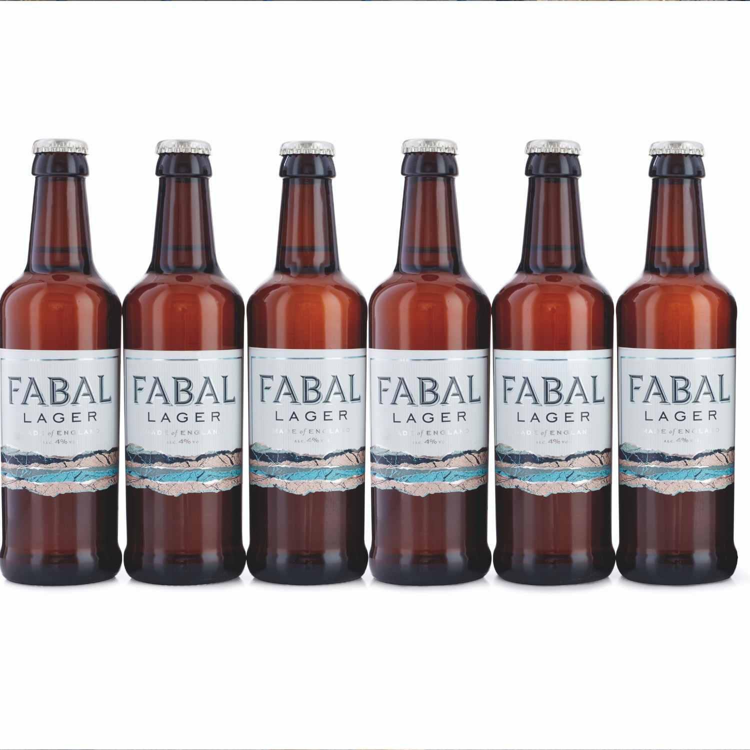 Six bottles of Fabal Lager standing in a row on white background